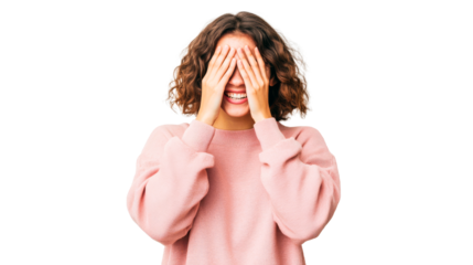 Brunette woman hides face with hands, smiling against black, cut out transparent