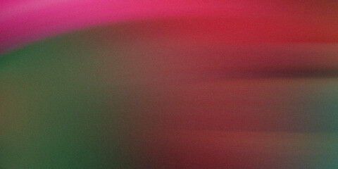 Abstract background featuring a blend of pink red and green colors creating a smooth gradient effect