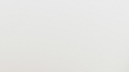 A plain white background with subtle variations in tone creating a minimalist abstract composition...