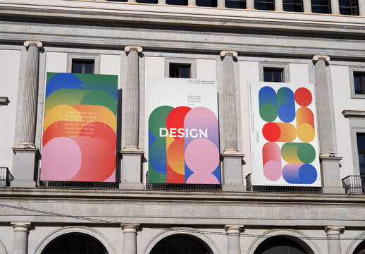 Mockup Of Three Vertical Customizable Banners On Building