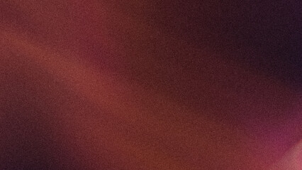 Abstract background featuring blended shades of red and purple creating a soft and blurred aesthetic effect