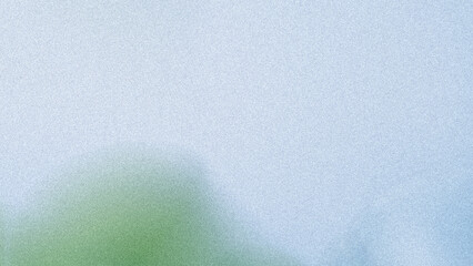 Abstract blurred background featuring a mix of light blue green and white creating a soft gradient effect