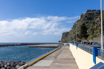 Empty promenade along the Atlantic Ocean in Calheta on the Portuguese island of Madeira