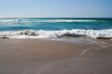 Waves on the empty  beach, Guincho beach, Portugal