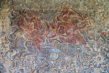 Angkor Wat, A remarkably tall building set against a clear blue sky backdrop