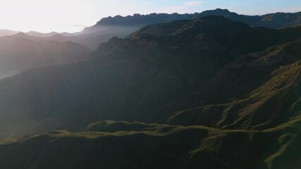 Experience breathtaking and stunning drone footage of the vibrant and picturesque Malibu mountains at sunset, beautifully capturing natures magnificent beauty in this unforgettable outdoor adventure