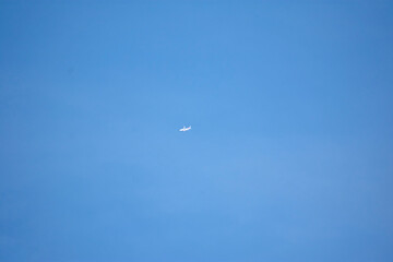 airplane in the blue sky