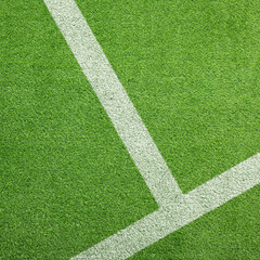 Football field with markings on green turf
