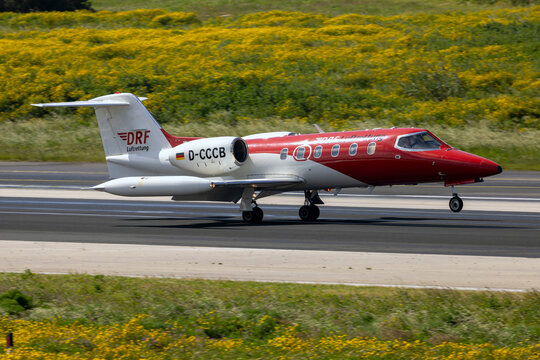Luqa, Malta - March 29, 2025: DRF Luftrettung Learjet 35A (REG: D-CCCB) arriving as an air ambulance flight.