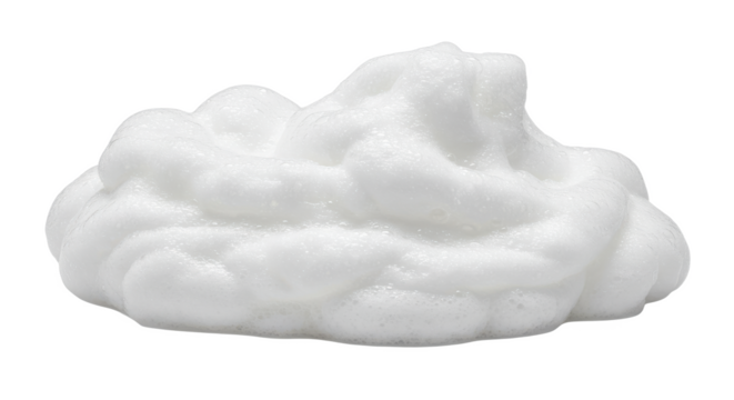 Close up view of a pile of fluffy white foam against a plain black background in a studio shot