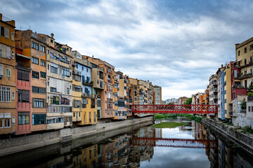 Colorful facades of houses on the river Onyar in Girona, Spain