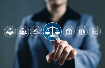 Legal Services and Business Law Concept. Legal professional touches virtual icons symbolizing law,...