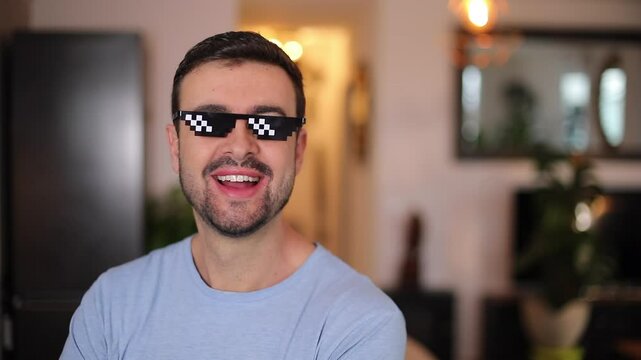 Man using cool sunglasses with pixels 