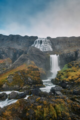 Dynjandi waterfall cascading through rugged cliffs in Westfjords, Iceland...