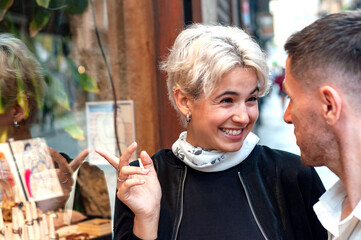 A Happy Couple Engaging in a Meaningful Conversation Outdoors in a Beautiful Environment