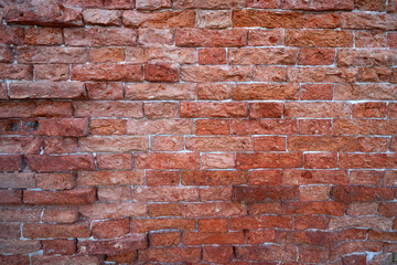 Old red brick background at natural light