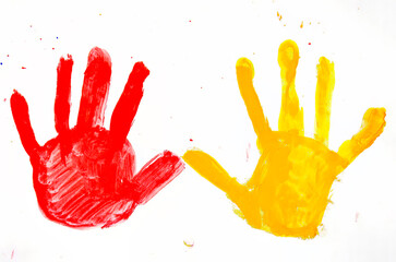 Red and Yellow Handprints Painted on a White Background
