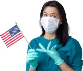 A girl in a medical mask and gloves holds an American flag in her hands. Coronavirus concept. Protect your health. .Stop the threat of a pandemic.