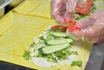 Homemade shawarma preparation - fresh ingredients and grilled meat