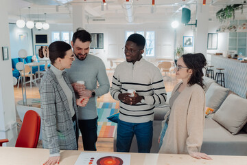 Marketing professionals discussing strategy in modern office