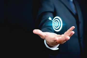Business achievement objective target concept, strategic planning for business growth and target customer group. Businessman holding target icon for business objective.