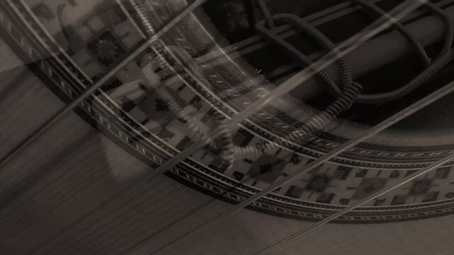 Spanish gutar close-up seamless loped photo animation with simple transitions in sepia colo tones
