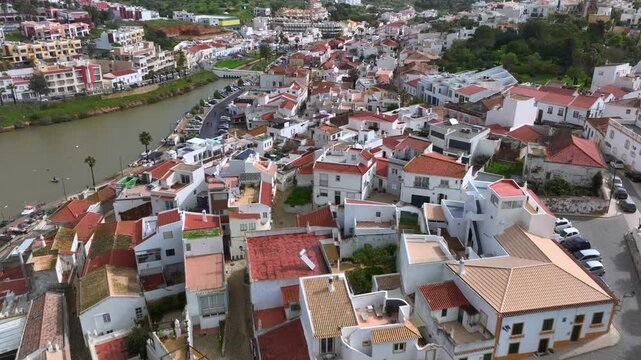 The Beautiful Traditional Fishing Village of Ferragudo, Portugal on Algarve coast, near Portimao. Aerial Drone View 