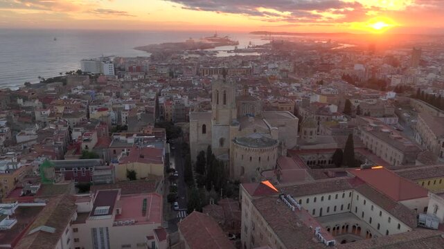 Catedral de Tarragona, Aerial view at Sunset Time with dramatic sky. Coastal City of Tarragona, Catalonia, Spain. 