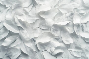 Handcrafted paper leaves create a textured, nature-inspired wall decoration.