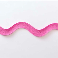 pink wavy line made of felt on a white background