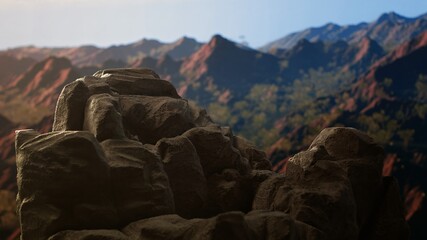 Panoramic view of a stunning mountain range with rocky terrain in the foreground. Perfect for...