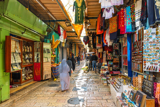 Narrow streets and alleys of shops in the Muristan Market and Avtimus Market in the Christian Quarter near the Church of the Holy Sepulchre in Old City Jerusalem, Israel March 9 2023.
