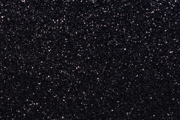 A black background with a lot of glitter