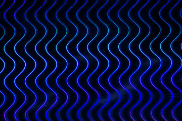 The image is a close up of a blue and purple wave pattern