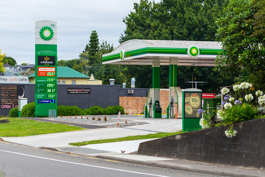 A BP petrol station with fuel price signage and gas pumps in Tirau, New Zealand