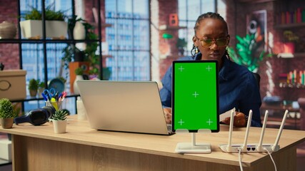 Black girl tries to fix an Wi Fi error by rebooting router next to isolated screen, troubleshooting...