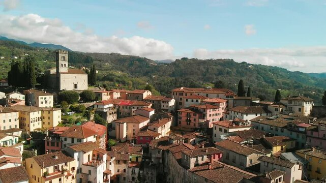 Aerial view of Barga, Garfagnana, showcasing the picturesque Italian village on a sunny day