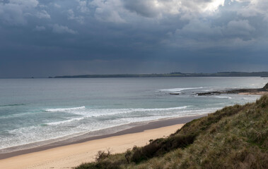 waves breaking over the rocks