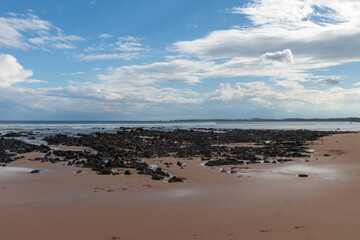waves breaking over the rocks