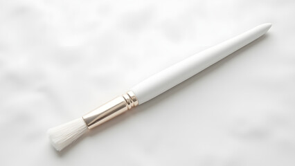 Fototapeta premium Handle-only white paintbrush on linen, presenting bristle-less form for minimalist art tool concepts.