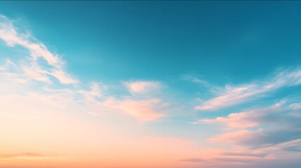 a clean summer sky with a gradient from deep blue at the top to a lighter blue near the bottom a few soft and wispy white clouds scattered subtle warm orange g