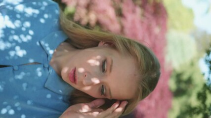 Woman struggling with anxiety, attempting calmness and relief, mental health challenge and emotional distress, vertical video portrait close up.