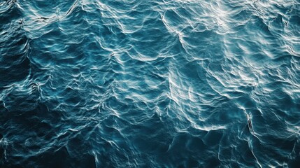 Aerial View of Ocean Waves Reflecting Sunlight, Background  Revealing Intricate Patterns and Textures in a Dynamic Aquatic Landscape, creating a mesmerizing visual experience