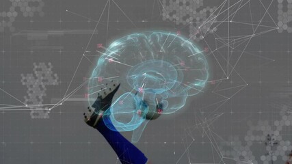 Animation of digital brain with network connections, person kicking soccer ball - Powered by Adobe