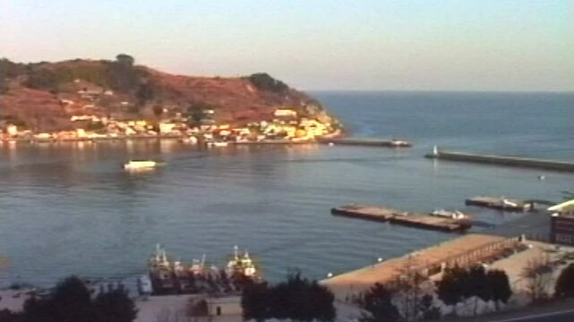 Quiet Marina With A Stunning View Of Hills And Blue Skies