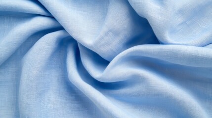Fototapeta premium a close-up of a flowing, light blue fabric.