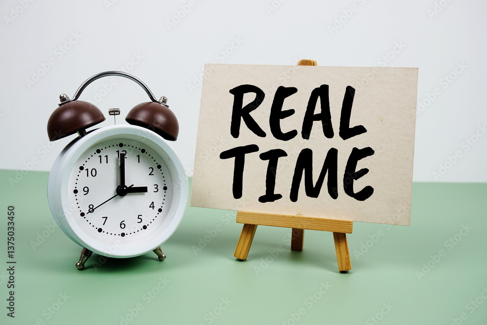 Poster real time text on paper card with alarm clock on green background