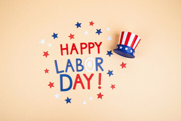 happy labor day card with red white and blue stars on the sand