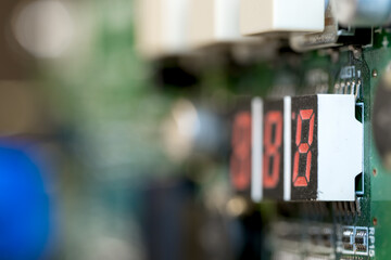 Close up view of digital counter on Printed circuit board.