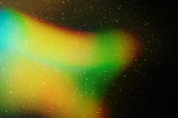 grainy colorful warm blue light leaks on black background with dust texture abstract damaged...